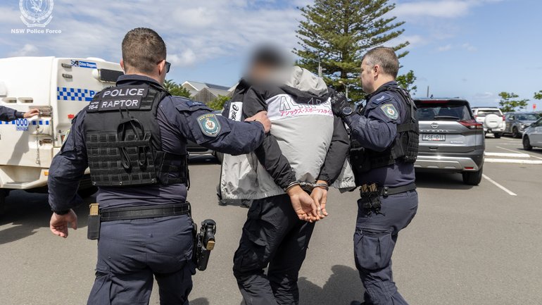 A Sydney dad was picking up his 15-year-old daughter from school when a gunman allegedly tried to kill them.