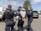 A Sydney dad was picking up his 15-year-old daughter from school when a gunman allegedly tried to kill them.