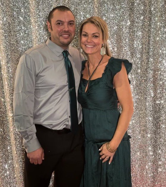 Ms Stevens pictured with her husband before complications from her hysterectomy left her with life-changing injuries.;