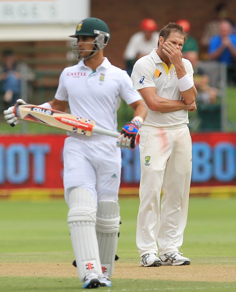 Australia's bowler Ryan Harris, right, reacts after six runs were scored by South Africa's batsman JP Duminy.