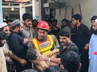 Locals rushed to the school, helping rescuers and frantically looking for children. 