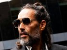 Russell Brand denies the allegations.