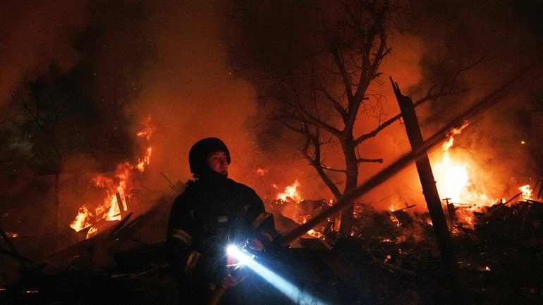 A firefighter at a compound hit by a strike in Kharkiv, northern Ukraine, on October 12, 2026. 