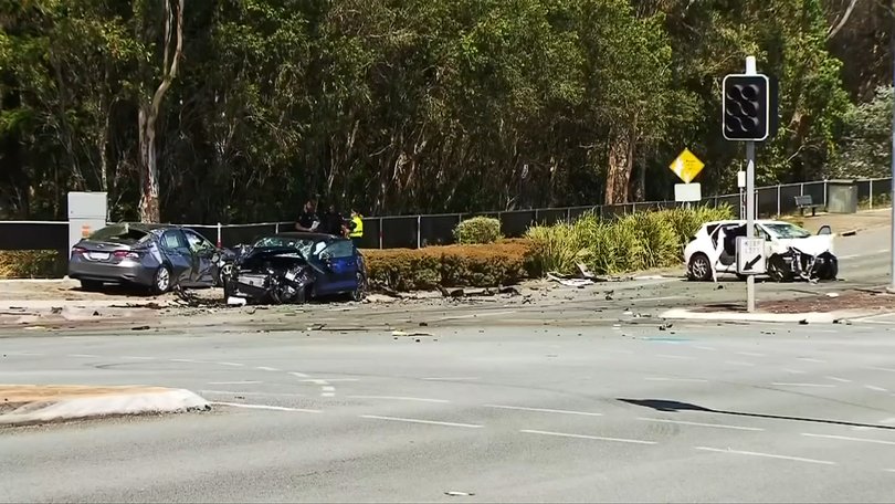 Police examining the wreckage after the crash.