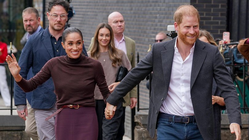 The pair were greeted by wellwishers. 