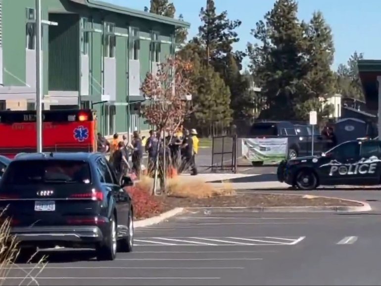 At least four people, including three children, have been killed after a gunman opened fire at a school in Oregon. 