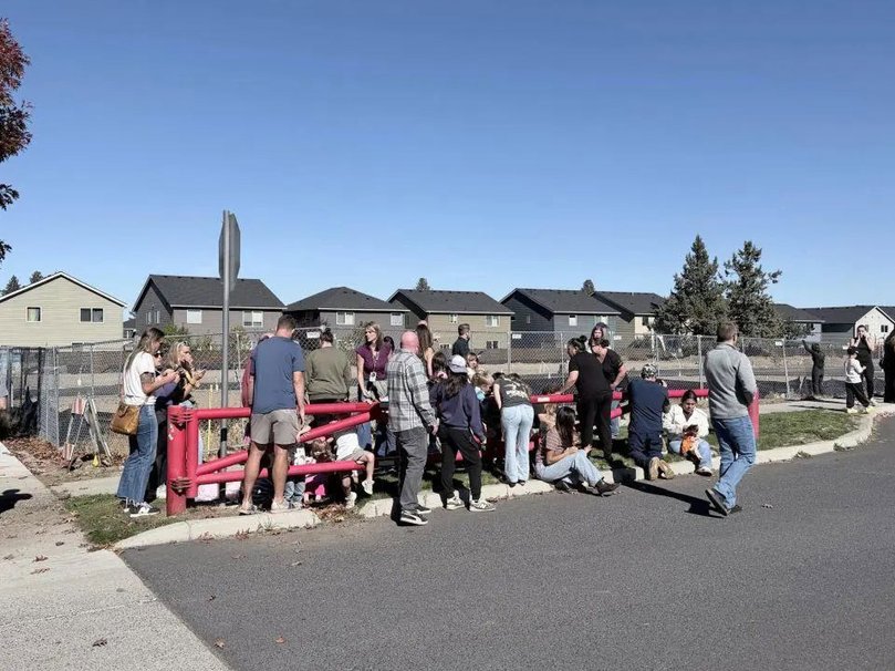 The unidentified shooter was shot dead after gunfire broke out on Thursday afternoon at Silver Rail Elementary School in the city of Bend.