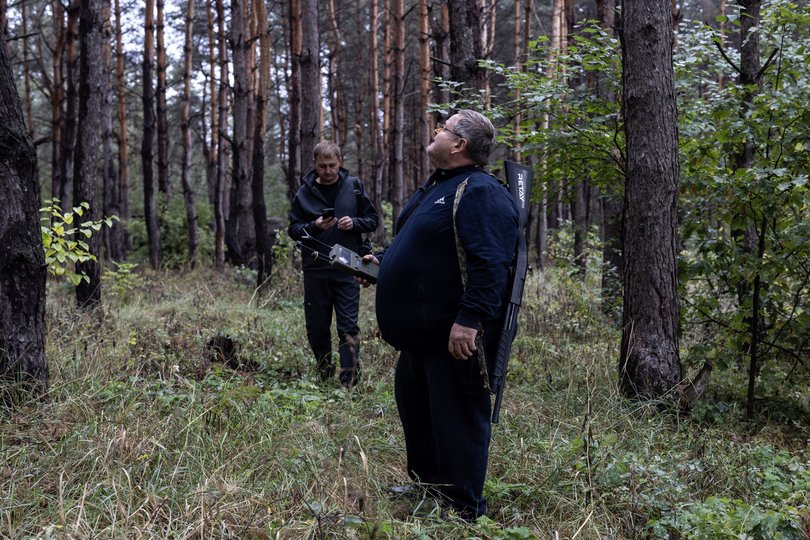 Volodymyr Matsui, front, monitors his Dzyga drone detector.