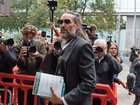 Russell Brand arrives at Southwark Crown Court on the fourth day of his trial.