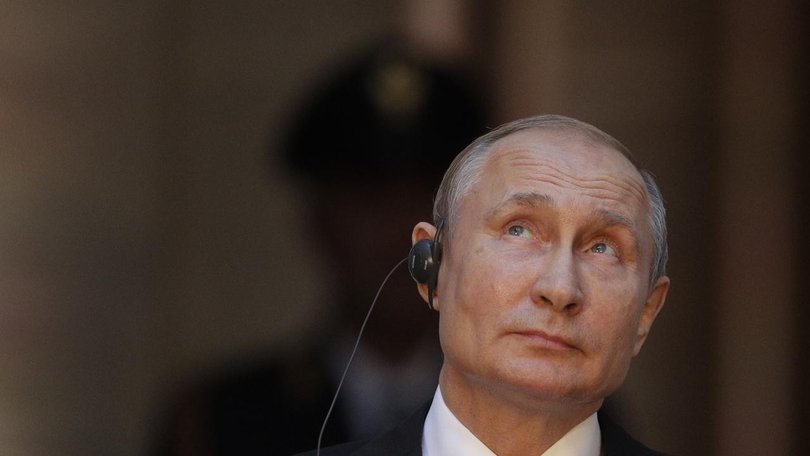 Russia President Vladimir Putin has agreed to Pope Leo's pleas for aid for a besieged Ukraine town. (AP PHOTO)