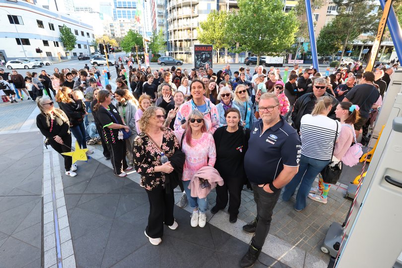 Crowds line up in anticipation for the opening.