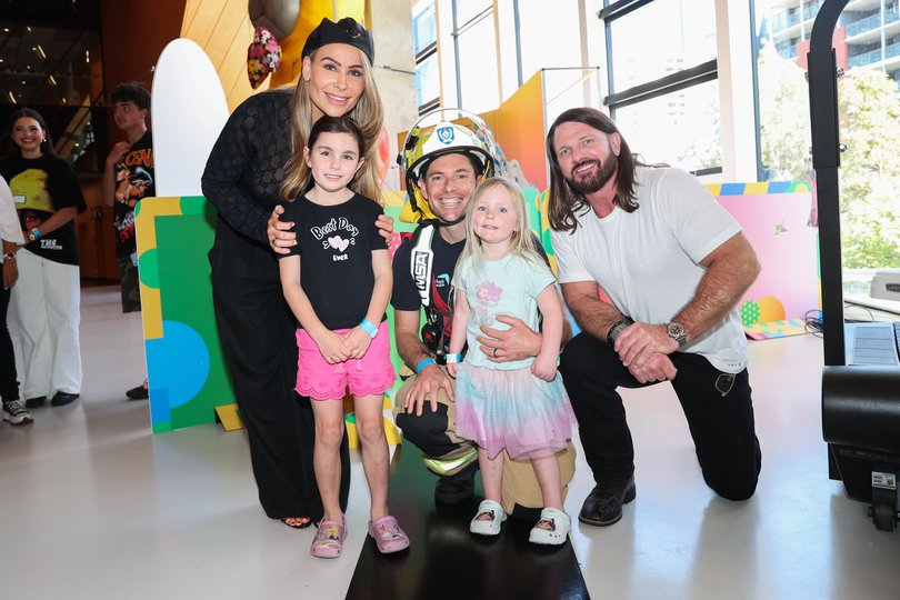 Phil Birch with his kids Charlotte, 6 and Ava, 3 with Nattie and AJ Styles.