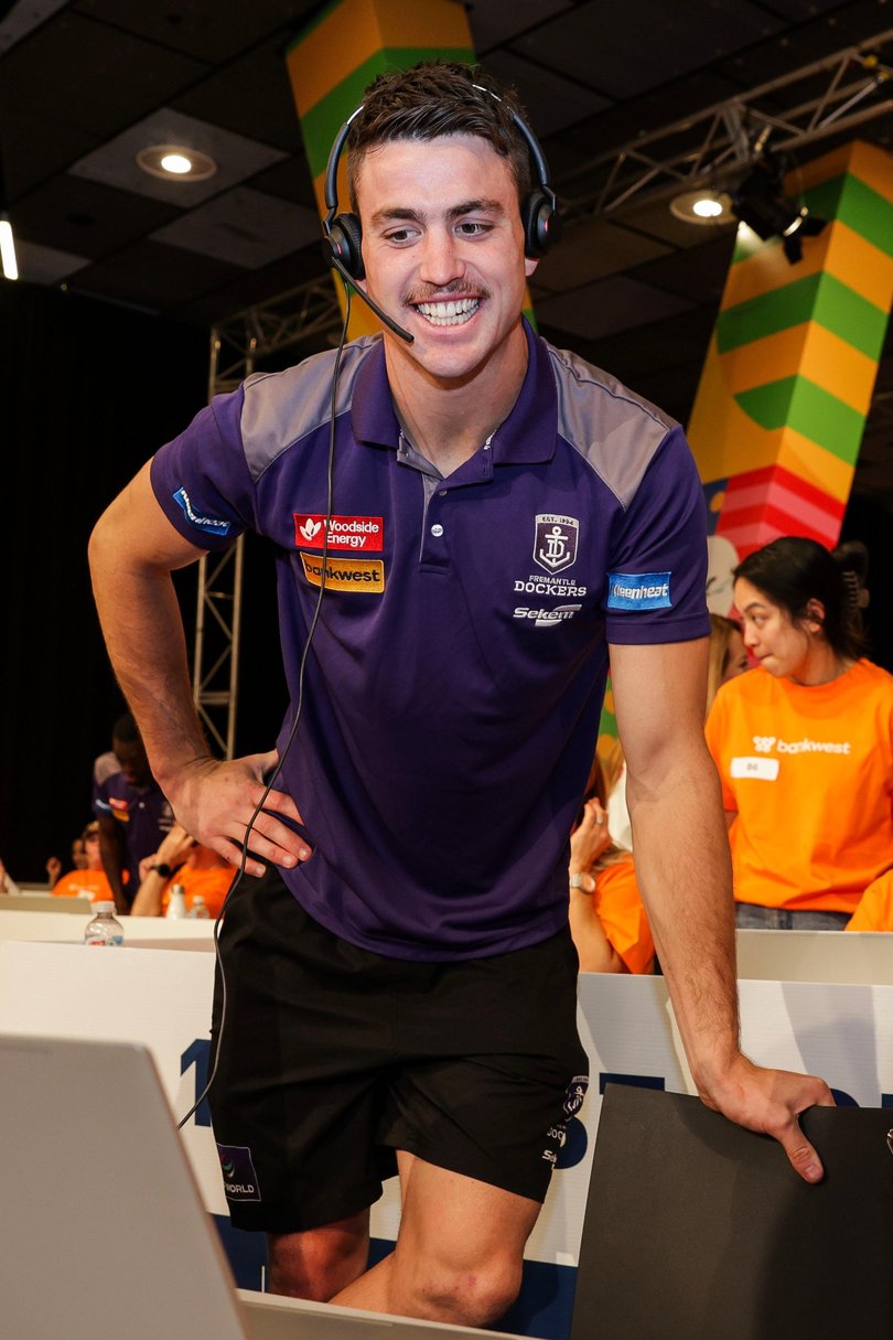 Fremantle Docker Pat Voss takes some calls.