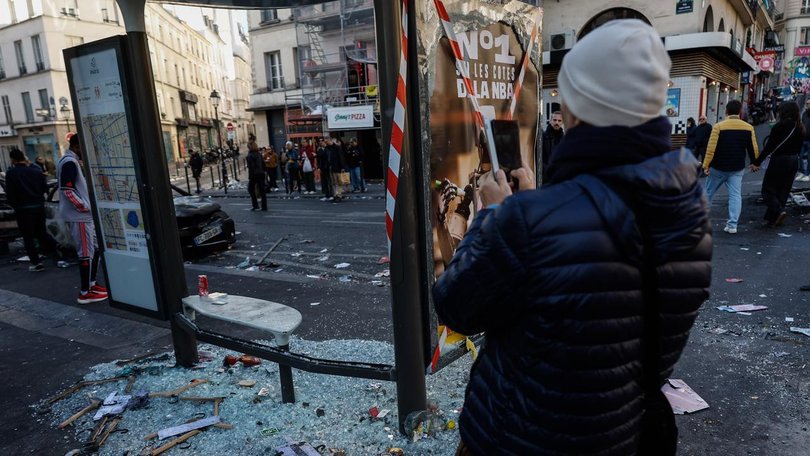 While thousands protested peacefully, violent fringe groups targeted public buildings and police.