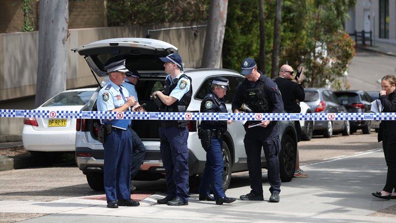 Police on the scene of a shooting near Constitution Road in Dulwich Hill.