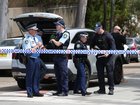 Police on the scene of a shooting near Constitution Road in Dulwich Hill.