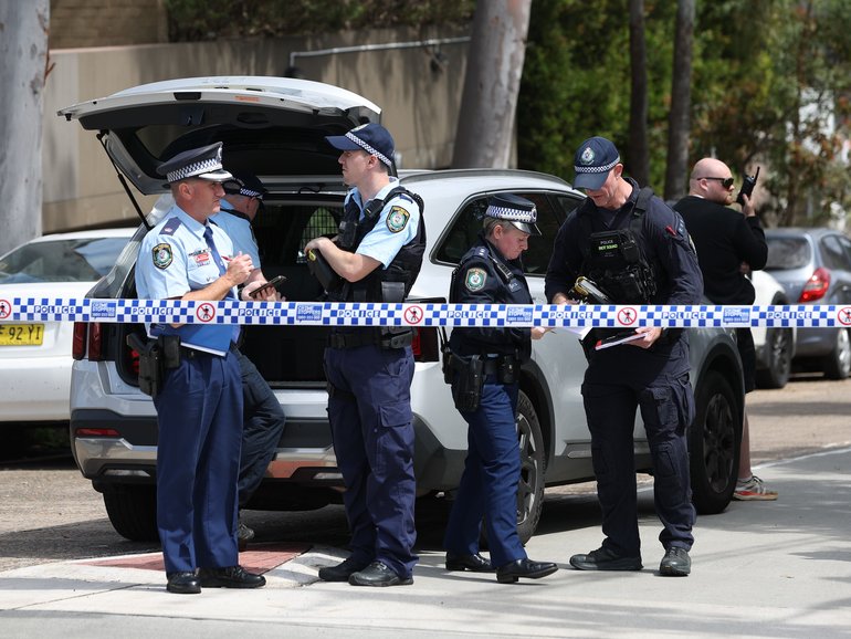 Police on the scene of a shooting near Constitution Road in Dulwich Hill.