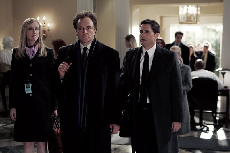 Janel Maloney, Bradley Whitford and Rob Lowe in The West Wing.