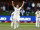 Scott Boland of Australia celebrates the dismissal of Ryan Rickelton.