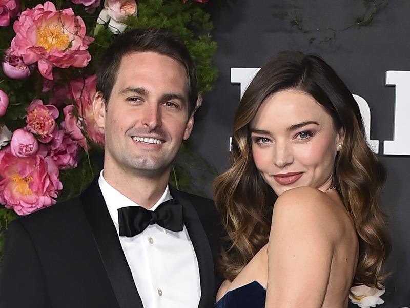 Evan Spiegel and Miranda Kerr wanted to shine a light on the work of non-profit Undue Medical Debt. (AP PHOTO)
