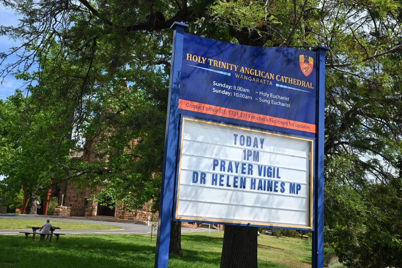 Signage advertising a vigil for independent federal MP Helen Haines at the Holy Trinity Anglican Cathedral in Wangaratta