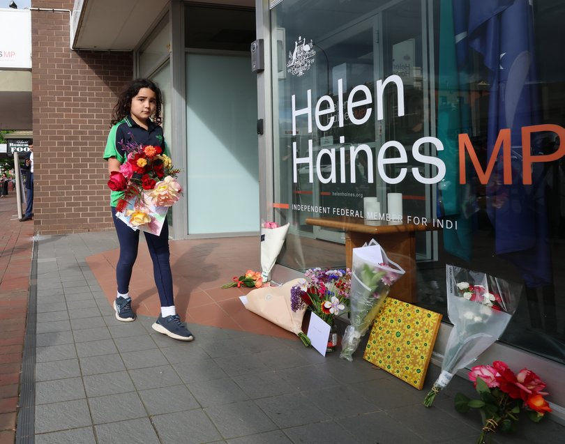 WANGARATTA, AUSTRALIA - NewsWire Photos - 20 OCTOBER, 2026: Independent Member for Indi Dr Helen Haines MP hit by car in Wangaratta. Locals lay flowers at the election office of Dr Helen Haines. Picture: David Caird / NewsWire