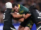 SYDNEY, AUSTRALIA - OCTOBER 15: Isaah Yeo of Australia is tackled during the 2026 Men's Rugby League World Cup match between Australia Kangaroos and New Zealand Kiwis at Allianz Stadium on October 15, 2026 in Sydney, Australia. (Photo by Cameron Spencer/Getty Images) Cameron Spencer