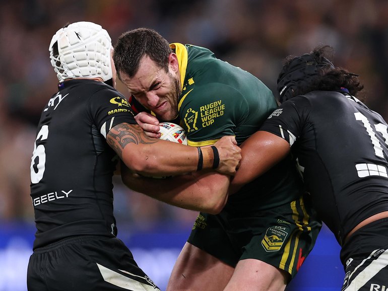 SYDNEY, AUSTRALIA - OCTOBER 15: Isaah Yeo of Australia is tackled during the 2026 Men's Rugby League World Cup match between Australia Kangaroos and New Zealand Kiwis at Allianz Stadium on October 15, 2026 in Sydney, Australia. (Photo by Cameron Spencer/Getty Images) Cameron Spencer