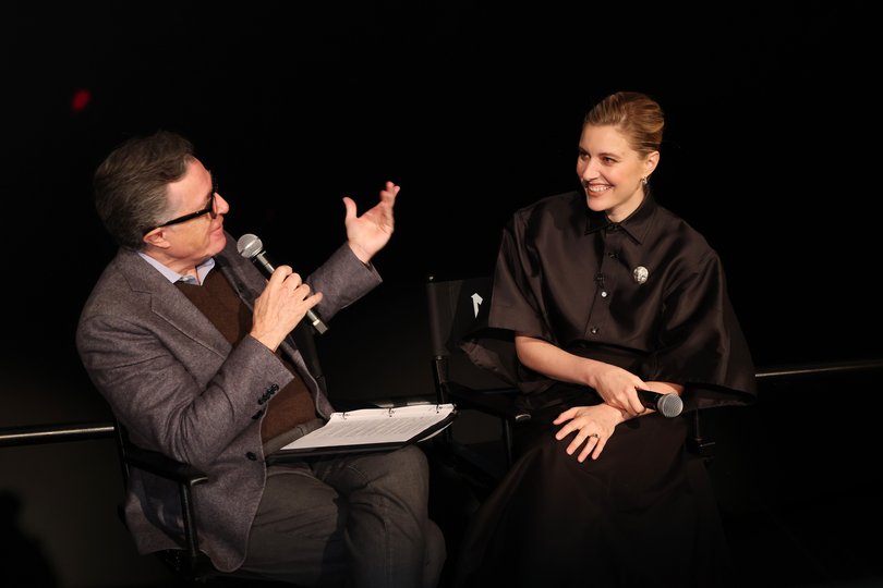 Stephen Colbert and Greta Gerwig speak onstage at Netflix's Narnia IMAX exclusive sneak peek event in New York City.