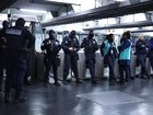 RATP transport security officers inside the closed off Republique Metro station in Paris.