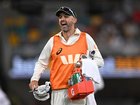 As he had been in Brisbane in December, Nathan Lyon was on drinks duty at Gqeberha. (Dave Hunt/AAP PHOTOS)