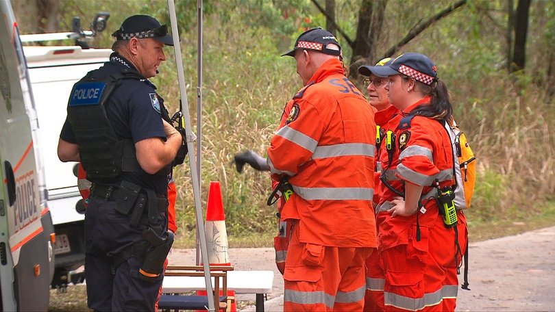 SES crews and police coordinate their work near the scene where Andy Parker’s body was found.