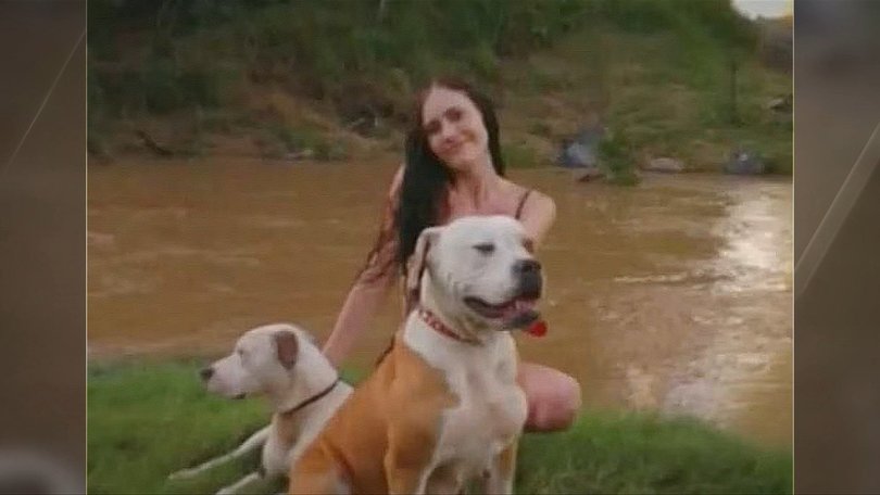 Layla Evans is pictured with the two dogs at the centre of the investigation.