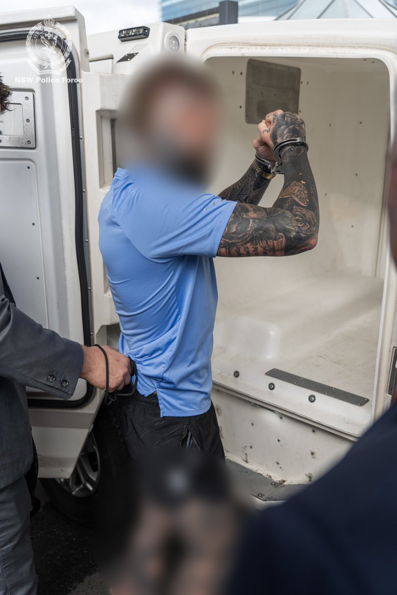 Mitchell West, 33, who is allegedly the outlaw motorcycle gang’s national sergeant-at-arms, was taken into custody shortly after arriving on a flight from Indonesia on Friday morning.