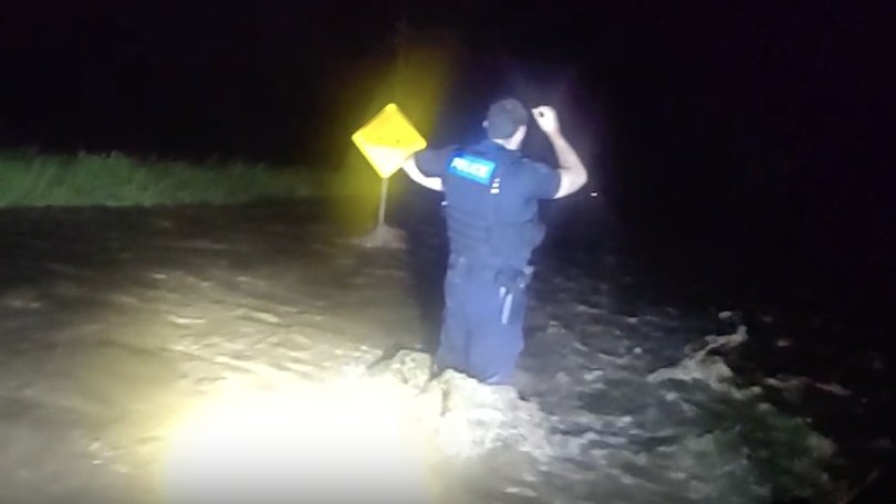 Police searched for a trapped driver nose deep in floodwater, but did not know his location. Picture: Qld Police
