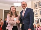 Labor Senator Charlotte Walker and Prime Minister Anthony Albanese shake hands during a Labor caucus meeting at Parliament House in Canberra, Monday, July 21, 2025. (AAP Image/Mick Tsikas) NO ARCHIVING