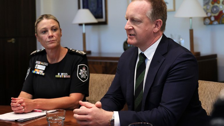 Federal Police Commissioner Krissy Barrett, Victorian Police Minister Paul Edbrooke, along with Prime Minister Anthony Albanese, Home Affairs Minister Tony Burke, Victorian Premier Ben Carroll and Chief Commissioner of Victoria Police Mike Bush, Australian address the media following the attack on federal MP Helen Haines in Wangaratta, at the Commonwealth Offices in Melbourne, Tuesday, October 20, 2026. (AAP Image/Con Chronis) NO ARCHIVING