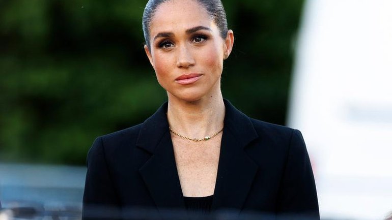 Meghan has revealed she prevented her father from having contact with her children ?to protect them. (AP PHOTO)