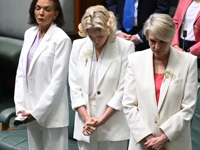 Anne Aly, Claire Clutterham and Tanya Plibersek pay respect to Dr Haines in the House of Representatives. 