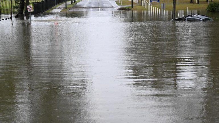 A man has tragically been found dead in Queensland floodwaters.