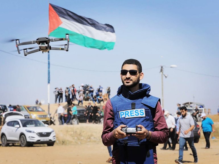 The ABC has faced explosive questions over whether freelancer Roshdi Sarraj, killed in Gaza, had links to Hamas.