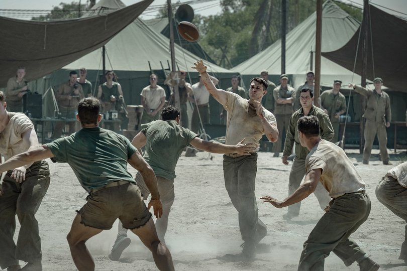The Mosquito Bowl. Nicholas Galitzine as John McLaughry in The Mosquito Bowl. Cr Kane Skennar / Netflix  2026