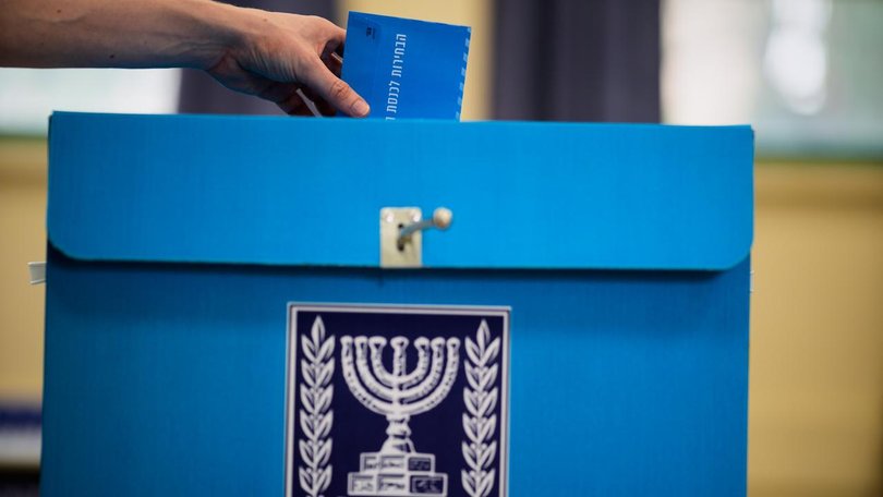 Exit polls show a tight race in Israel's election with no clear winner emerging. (AP PHOTO)
