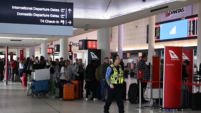 Queues at Perth Airport Qantas Terminal.
