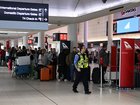 Queues at Perth Airport Qantas Terminal.
