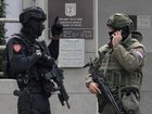 Serbia's security threat level is at the highest level after an attack outside the Israeli embassy. (AP PHOTO)
