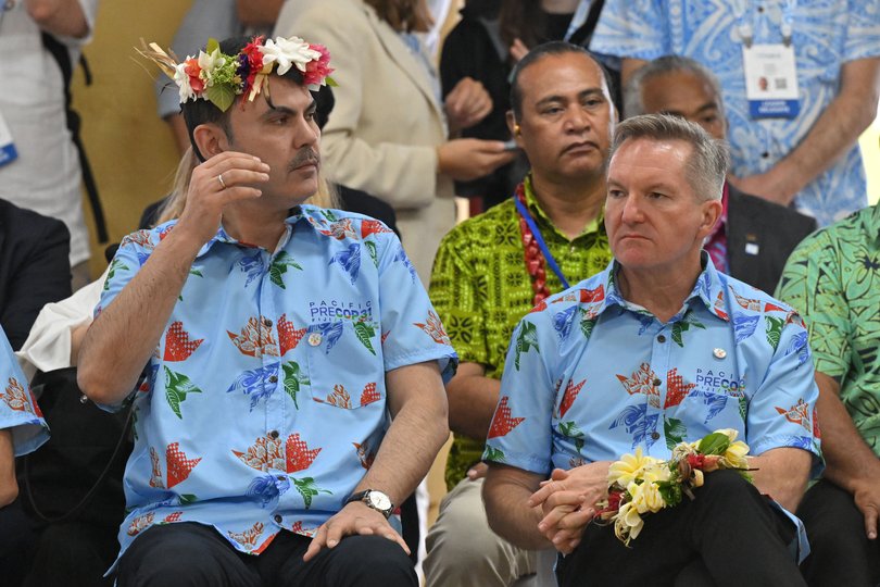 FUNAFUTI, TUVALU - OCTOBER 06: Minister of Environment, Urbanization and Climate Change for Türkiye Murat Kurum and Minister for Climate Change and Energy of Australia Chris Bowen attend a traditional welcome ceremony as part of the Pacific Pre-COP31 Summit on October 6, 2026 in Funafuti, Tuvalu. The Pacific pre-COP31 meeting is being held in Nadi, Fiji, from Oct. 5–8, with leaders from Australia, New Zealand, and the Pacific gathering. Delegates and ministers met to build momentum for the COP31 climate summit, while regional leaders also convened in Tuvalu to spotlight the existential threat rising seas pose to low-lying Pacific nations. (Photo by Mick Tsikas- Pool/Getty Images)