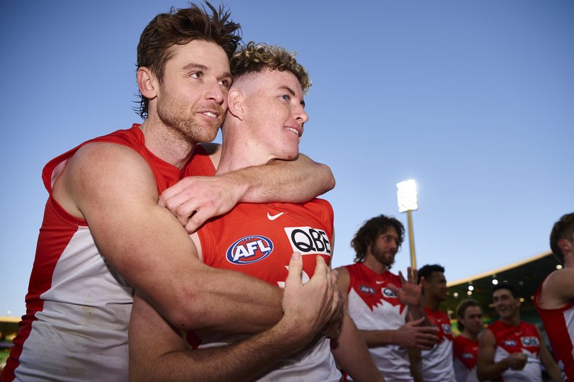 Dane Rampe with Chad Warner in 2022.