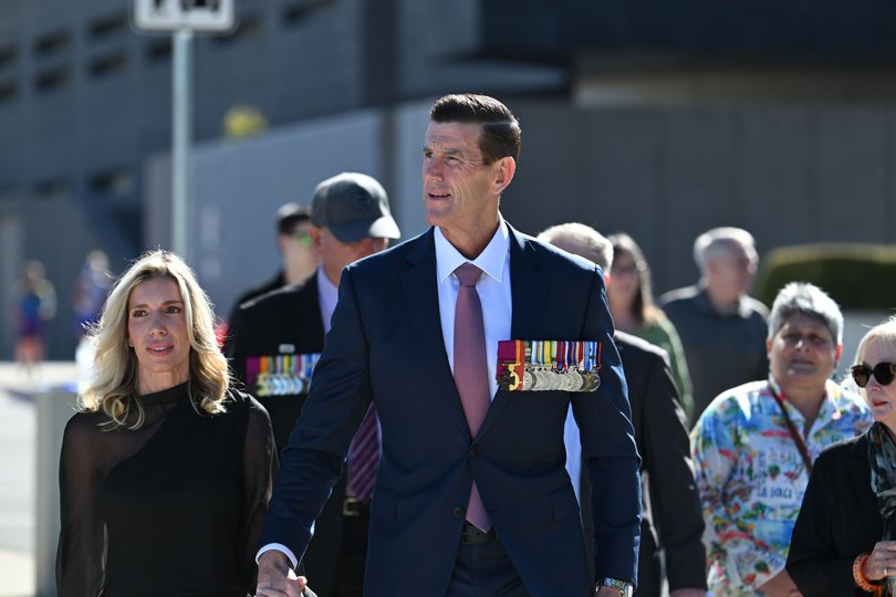 CANBERRA, AUSTRALIA- OCTOBER 11, 2026: Ben Roberts-Smith and his partner Sarah Matulin arrive at the national commemorative service marking the 25th anniversary of Australian service at the Australian War Memorial. Picture: NewsWire / Martin Ollman