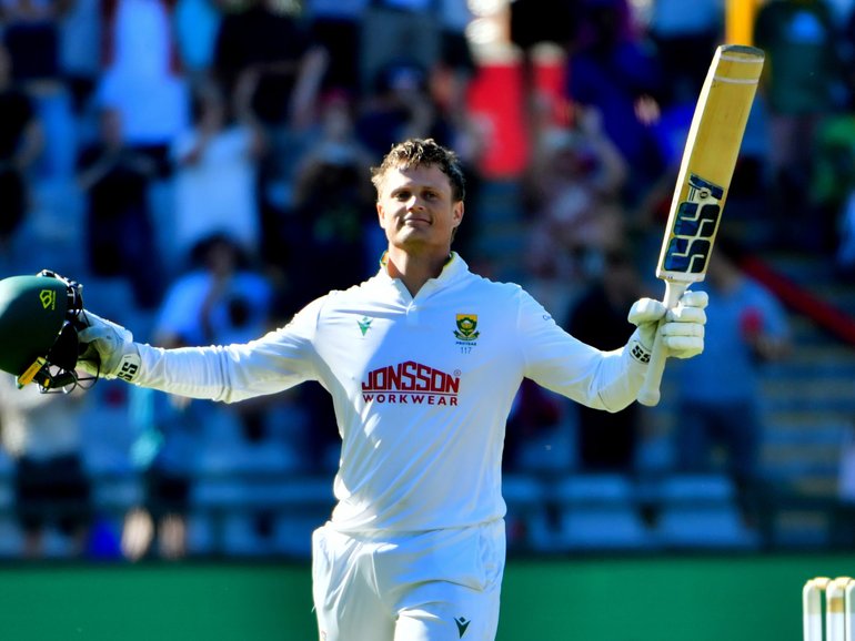 Ryan Rickelton of South Africa celebrates scoring a century.